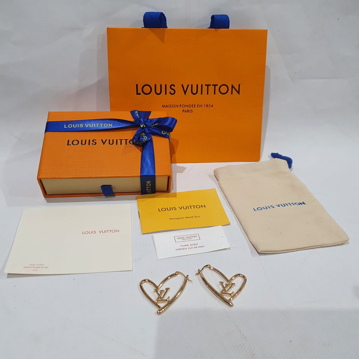 Louis Vuitton heart shaped Earrings – Merit Trends