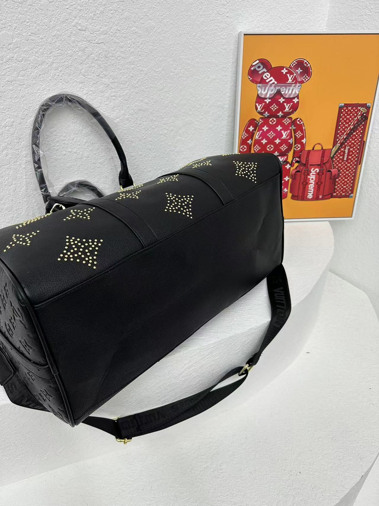 Louis vuitton handbag ( weekender / traveling bag)