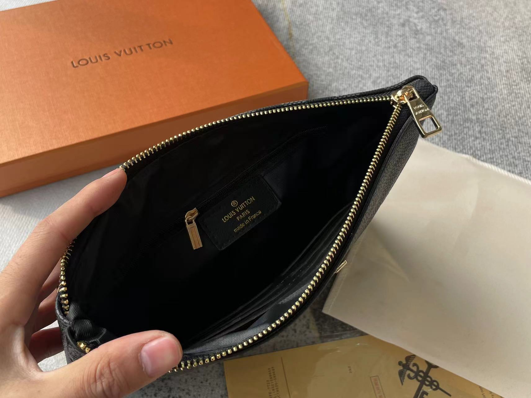 Louis vuitton handbag (wristlet   bag)