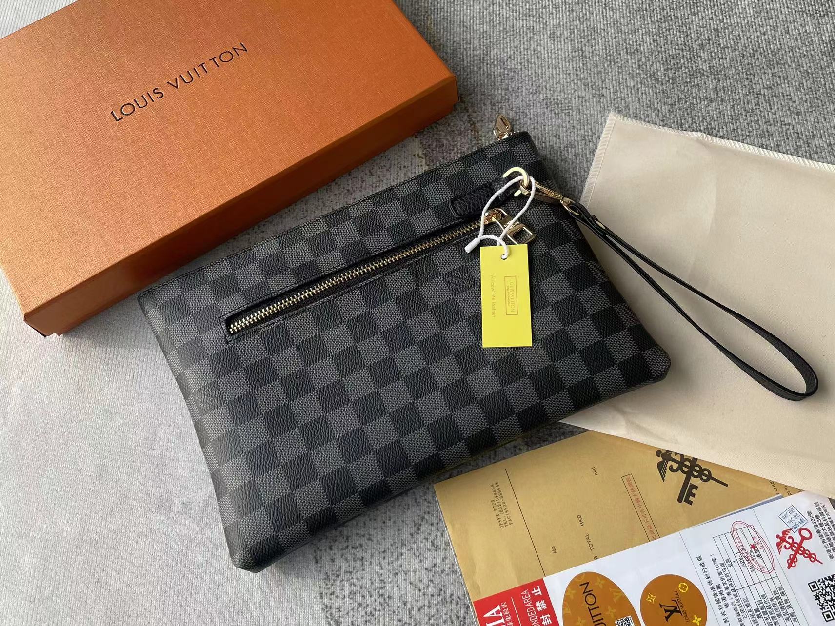 Louis vuitton handbag (wristlet   bag)