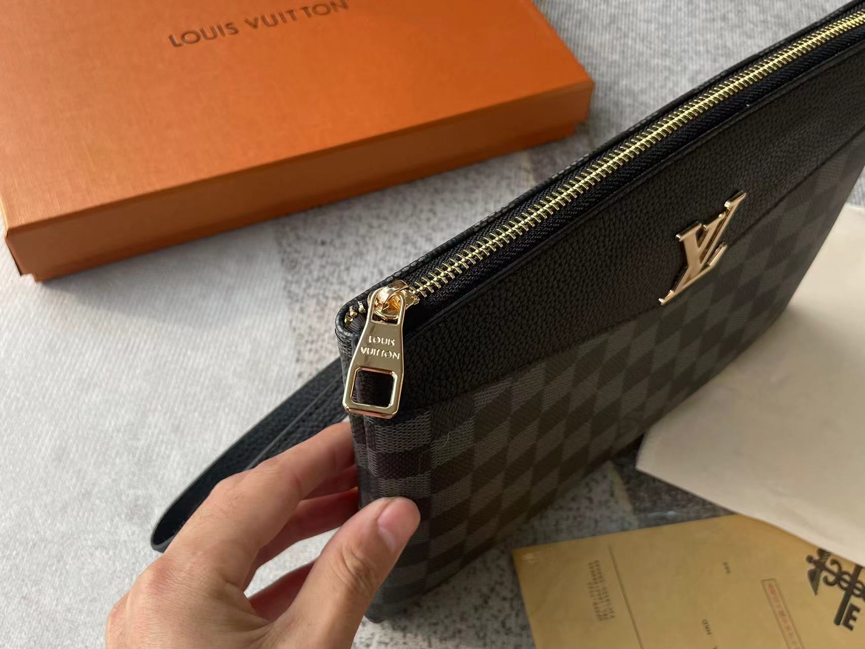 Louis vuitton handbag (wristlet   bag)