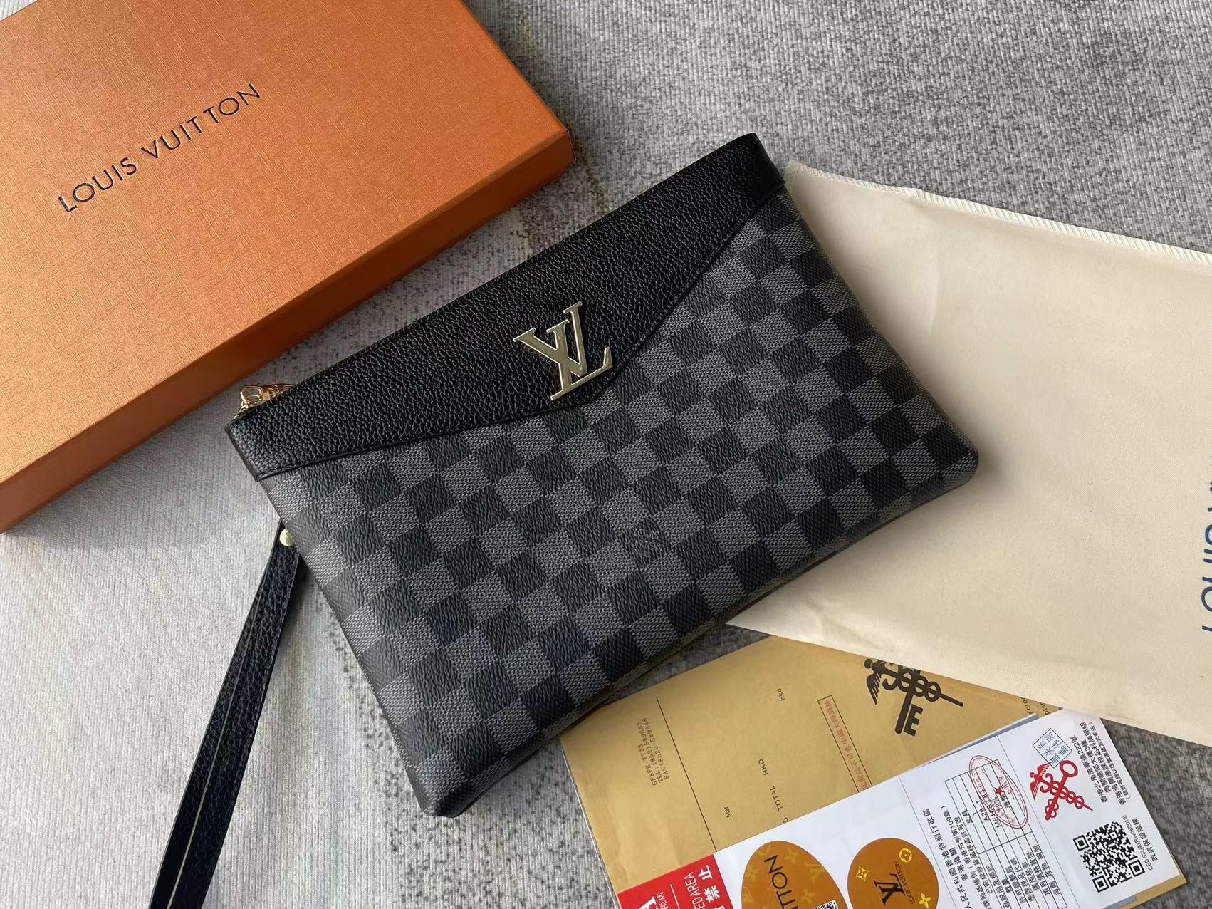 Louis vuitton handbag (wristlet   bag)