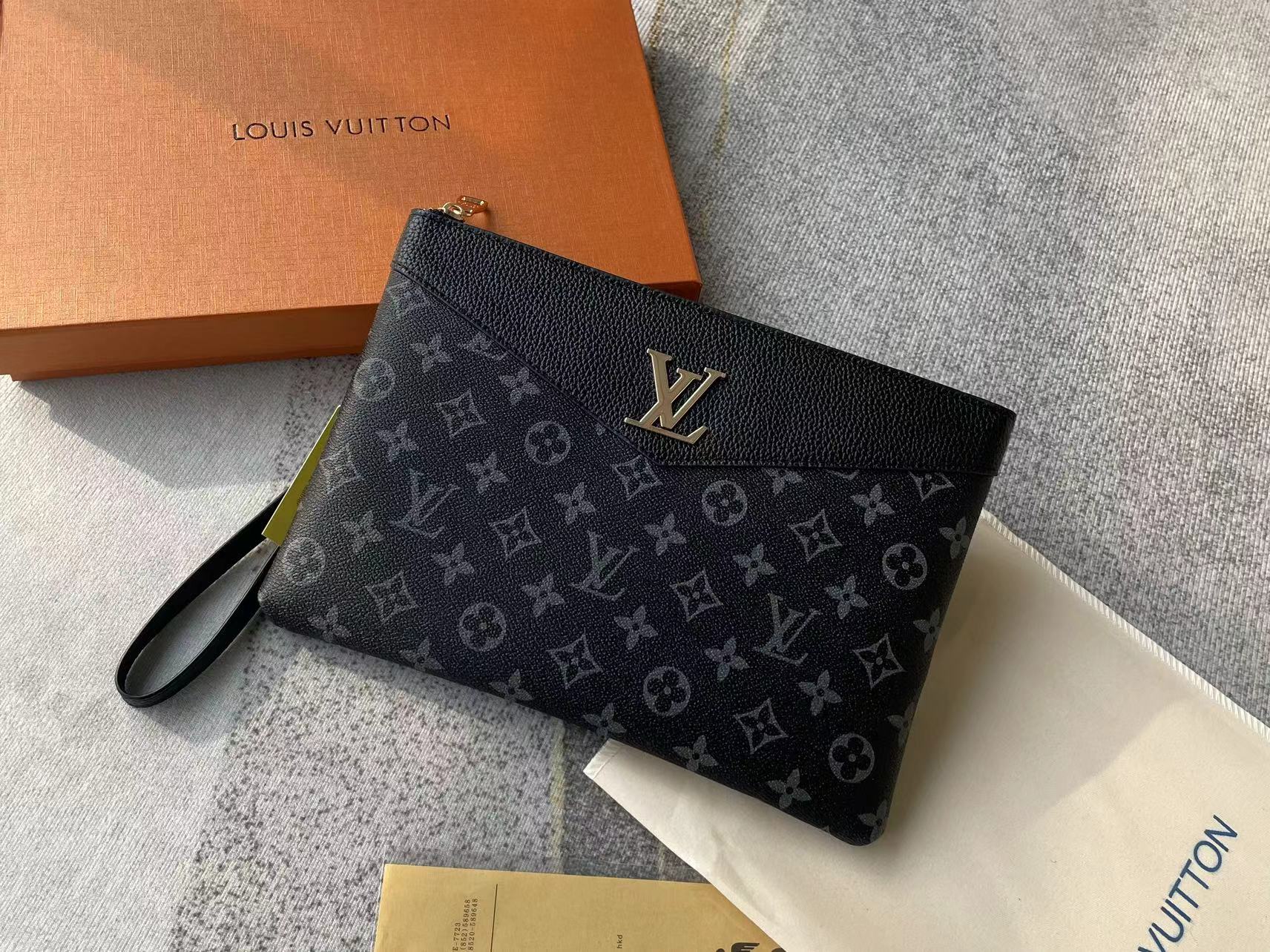 Louis vuitton handbag (wristlet   bag)