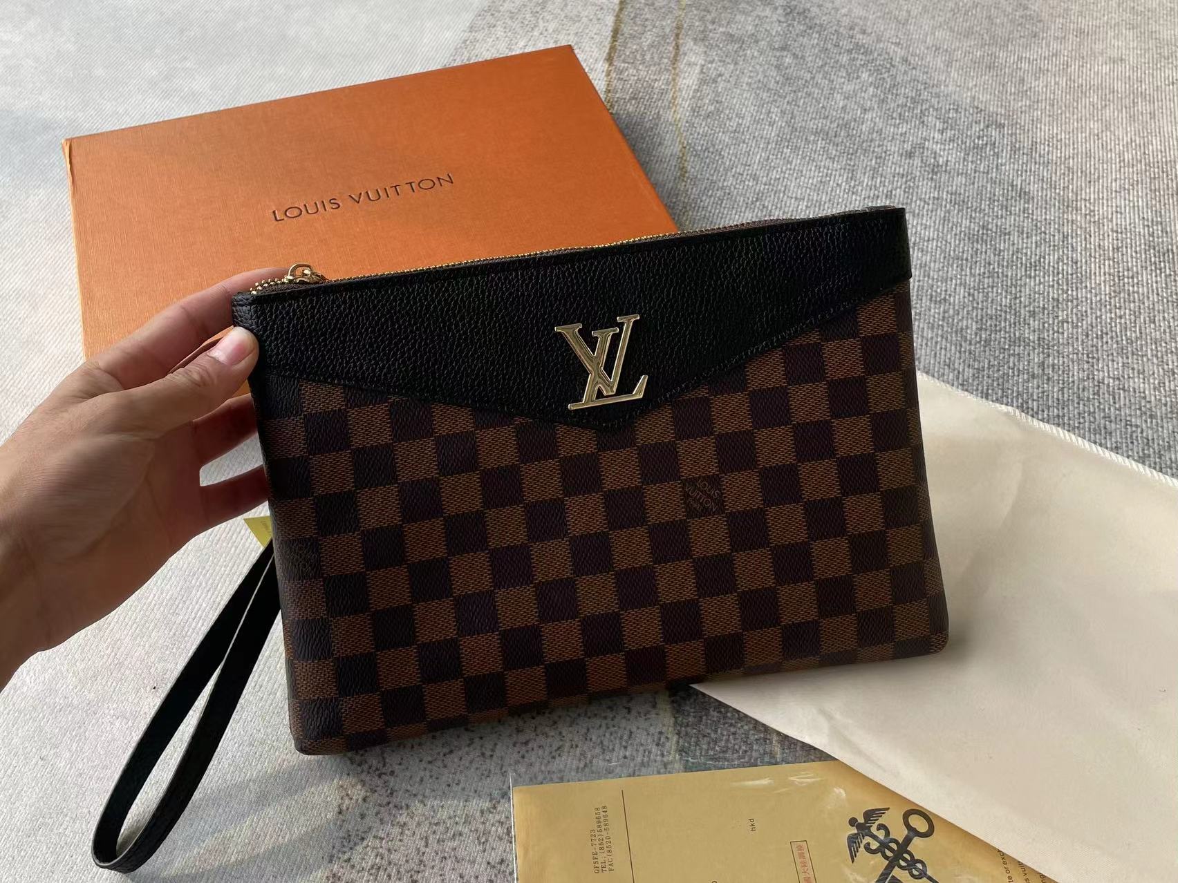 Louis vuitton handbag (wristlet   bag)