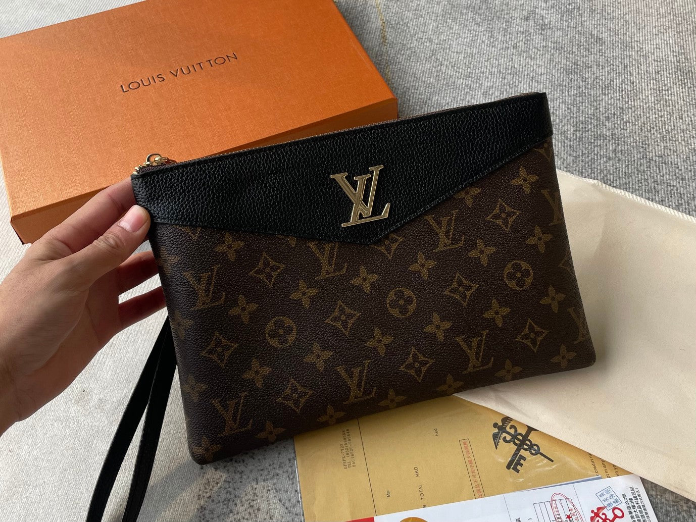 Louis vuitton handbag (wristlet   bag)