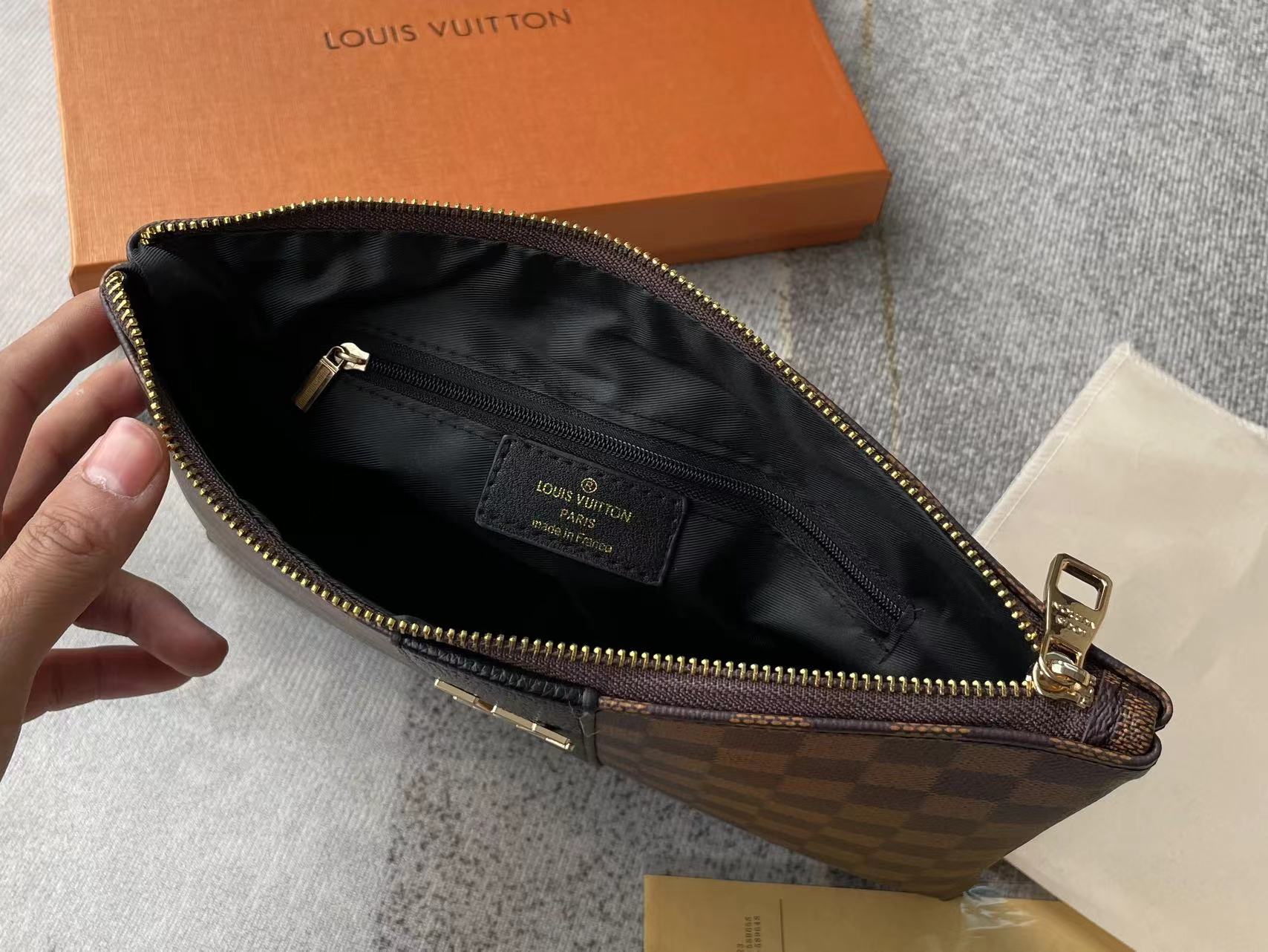 Louis vuitton handbag (wristlet   bag)