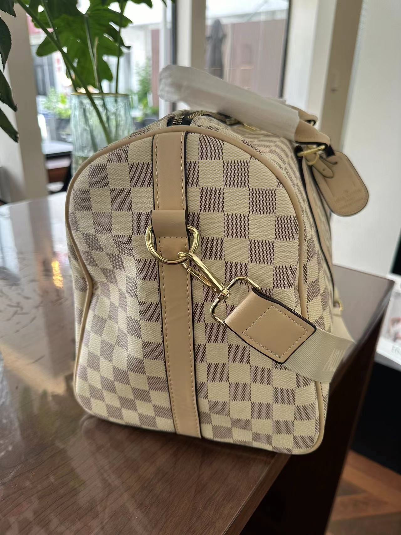 Louis Vuitton handbags (duffle bag, weekender)