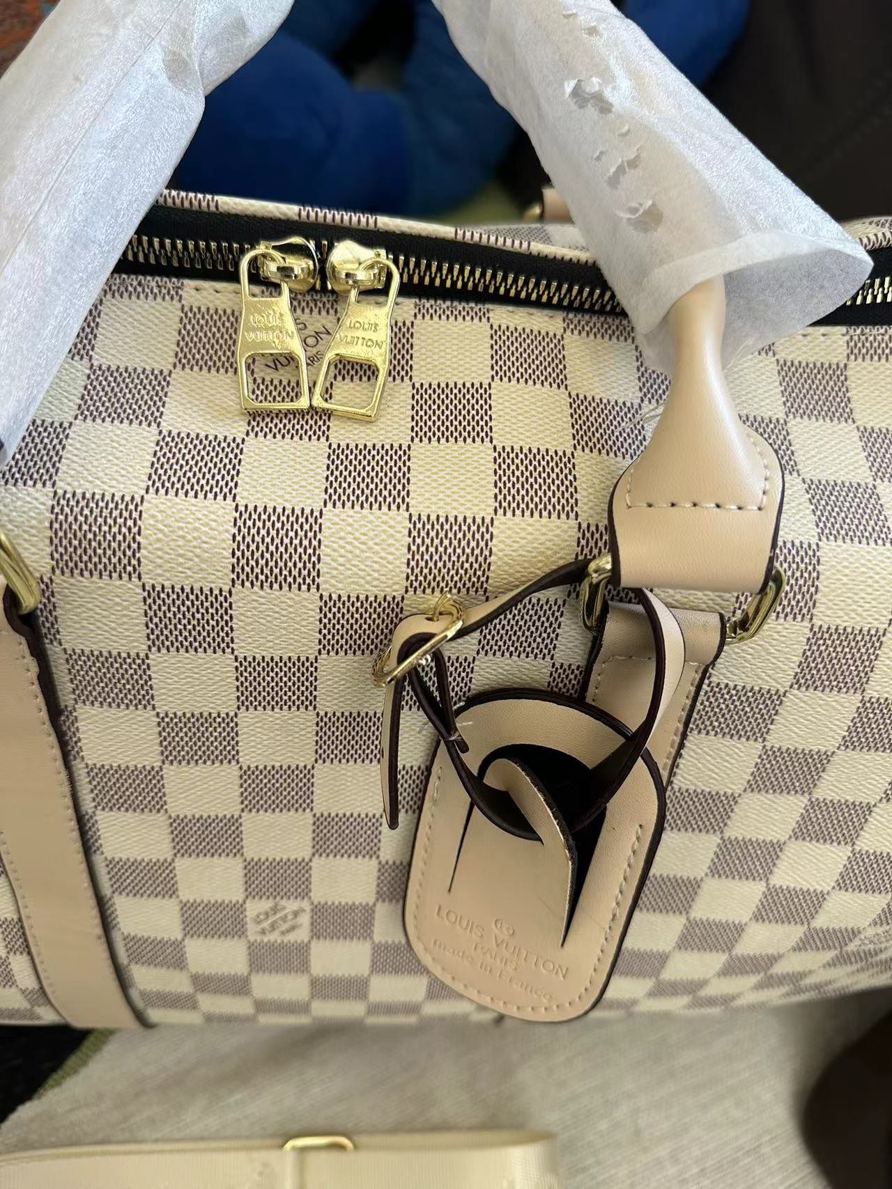 Louis Vuitton handbags (duffle bag, weekender)