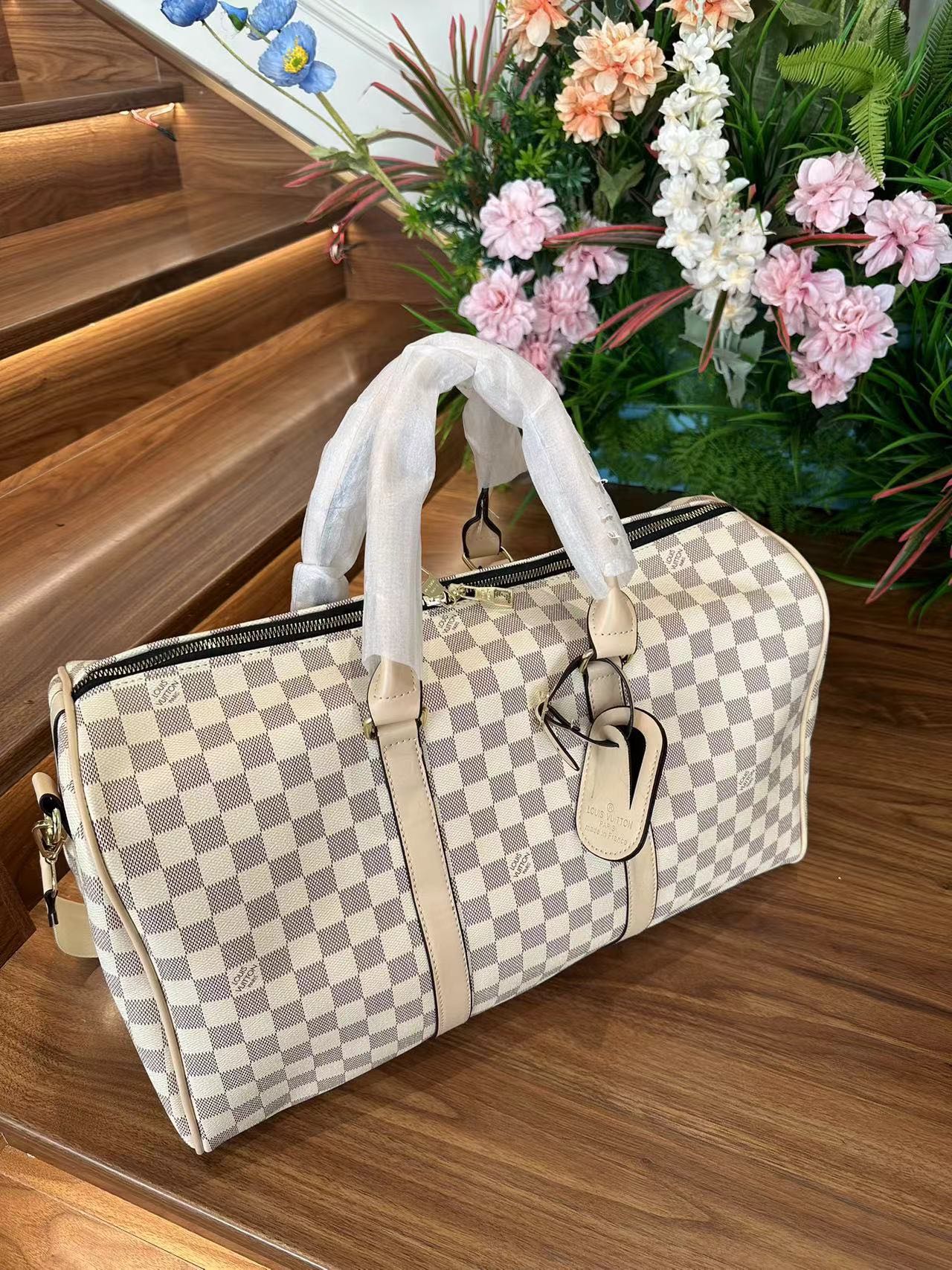 Louis Vuitton handbags (duffle bag, weekender)