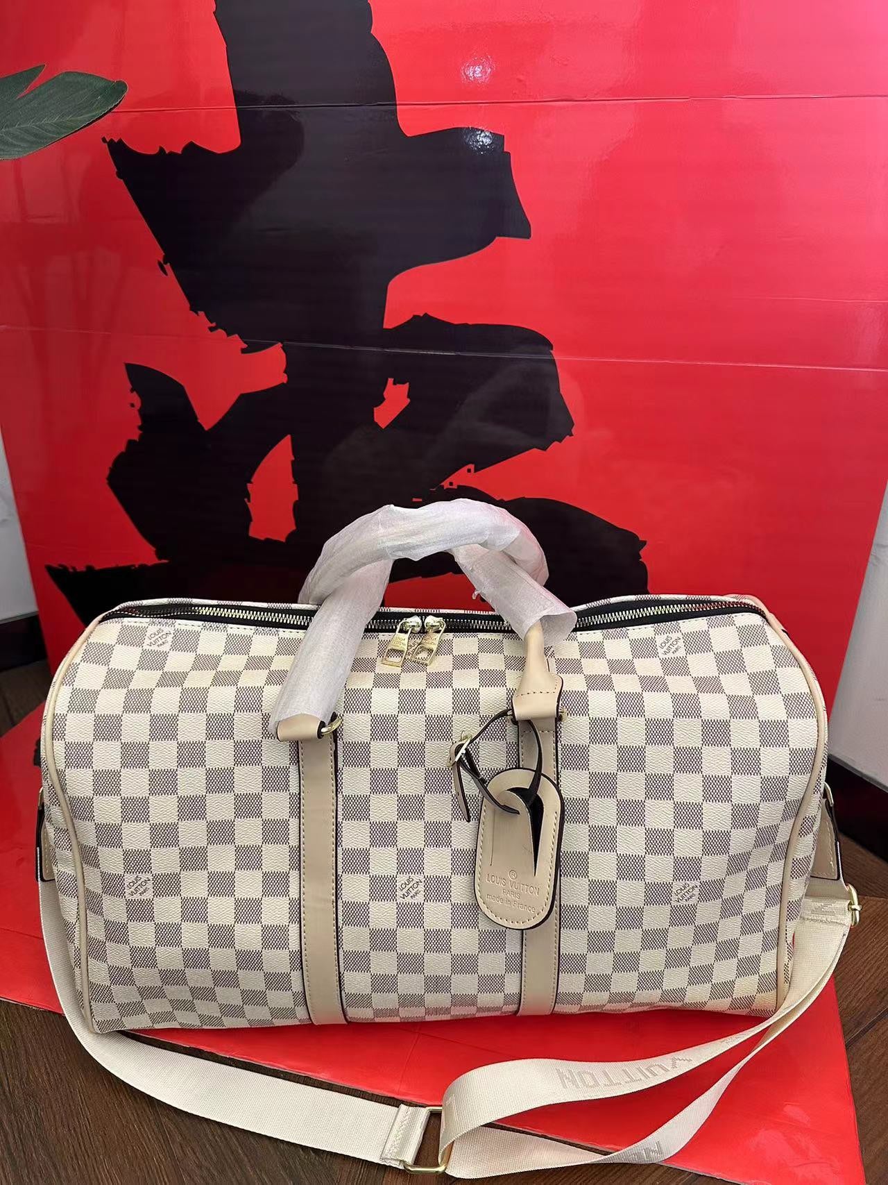 Louis Vuitton handbags (duffle bag, weekender)