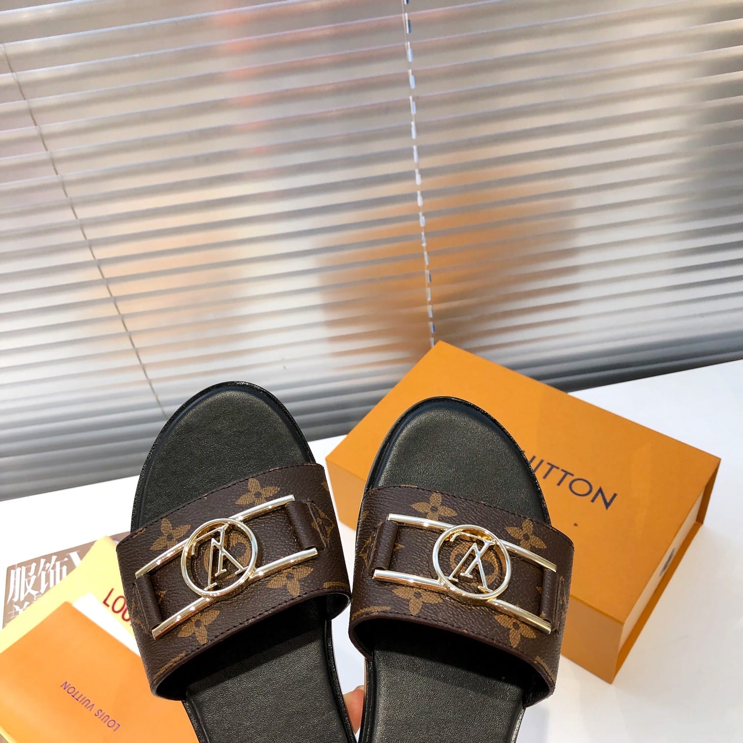 Louis Vuitton Lock It Flat Mules Sandals – Merit Trends